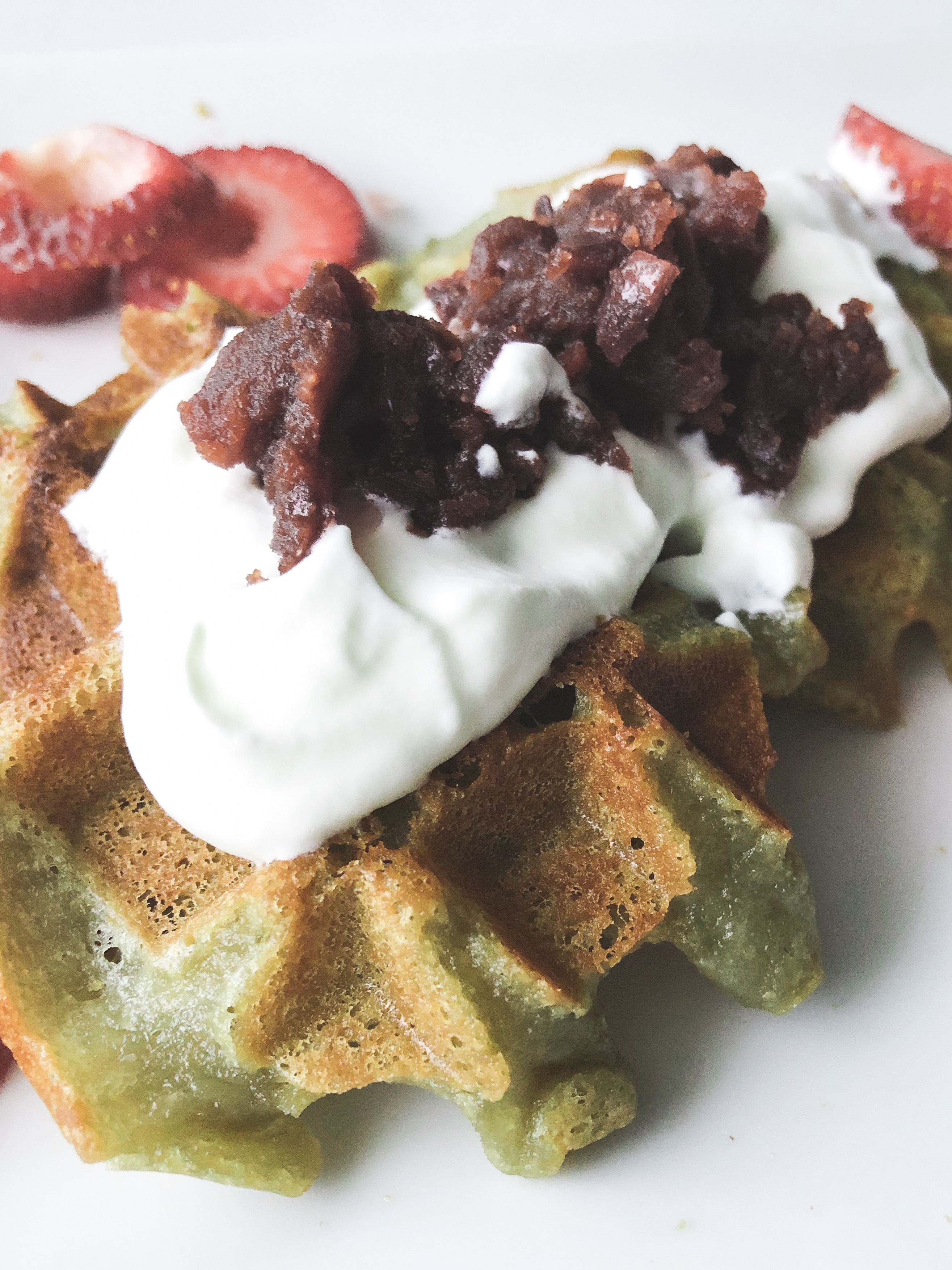 matcha mochi waffles with whipped cream and red bean topping